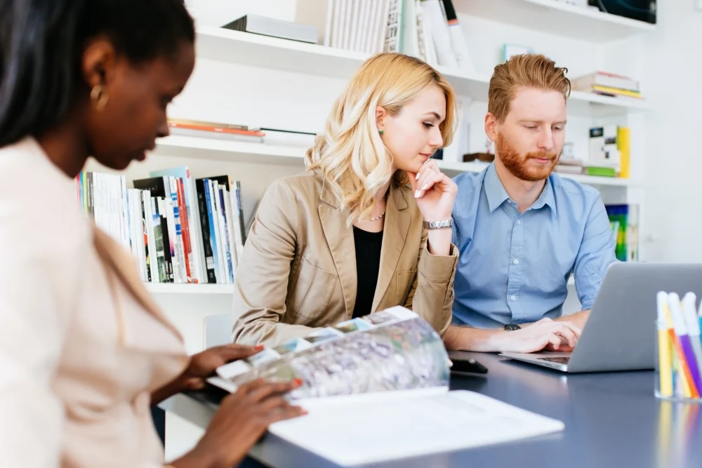 Colleagues working together in a shared office