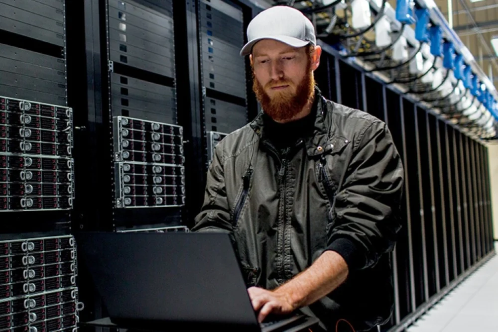 A technician working on server infrastructure